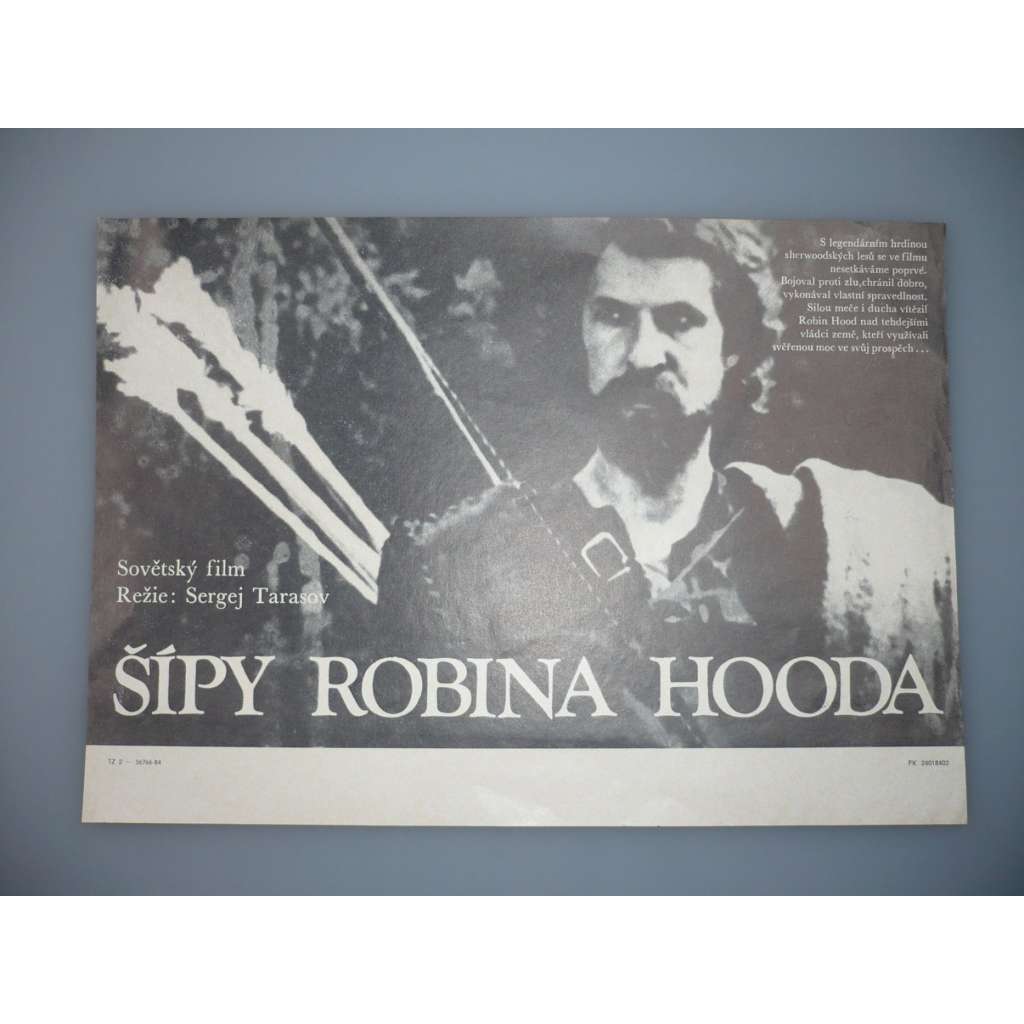 Šípy Robina Hooda (filmový plakát, papírová fotoska, slepka, film SSSR 1976, režie Sergej Tarasov, Hrají: Boris Chmelnickij, Regīna Razuma, Ivars Kalninš)