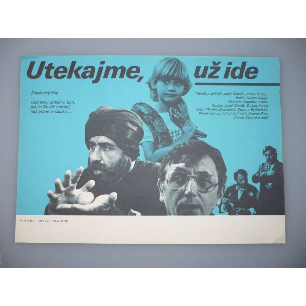 Utíkejme, už jde! (filmový plakát, papírová fotoska, slepka, film ČSSR 1986, režie Dušan Rapoš, Hrají: Marián Zednikovič, Zuzana Bydžovská, Milan Lasica)