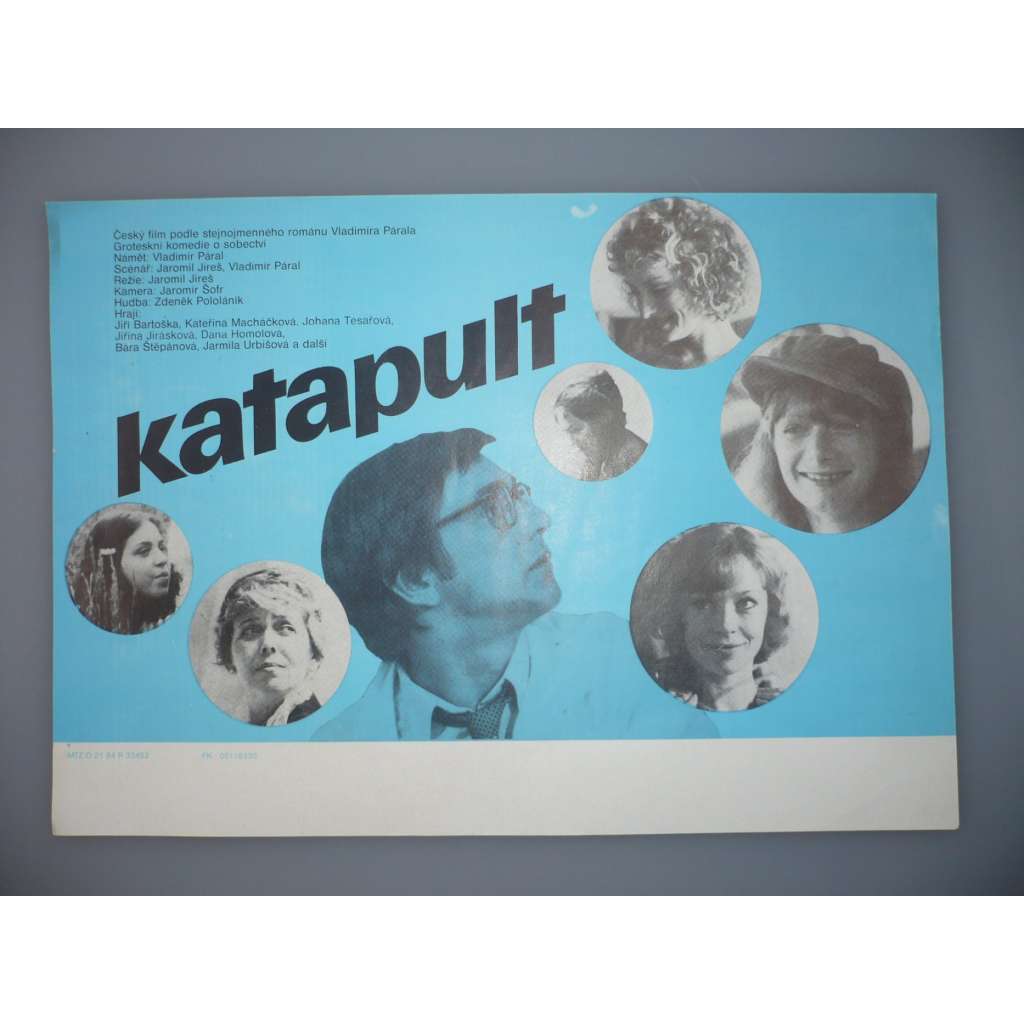 Katapult  (filmový plakát, papírová fotoska, slepka, film ČSSR 1983, režie Jaromil Jireš, Hrají: Jiří Bartoška, Kateřina Macháčková, Jiřina Jirásková)