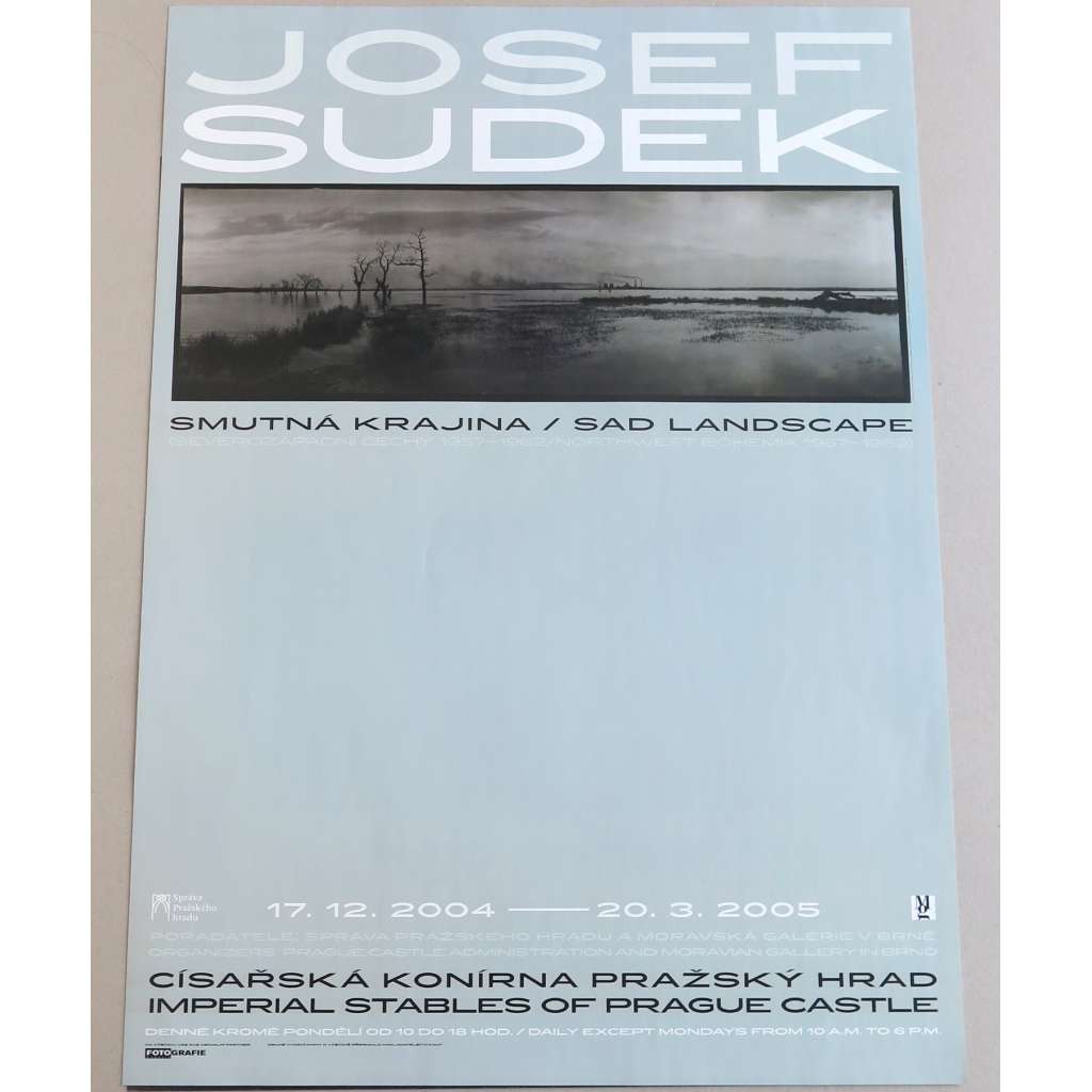Josef Sudek. Smutná krajina. Severozápadní Čechy 1957-1962 = Sad Landscape. Northwest Bohemia 1957-1962 [plakát výstavy; Císařská konírna, Pražský hrad, 17. 12. 2004 - 20. 3. 2005]