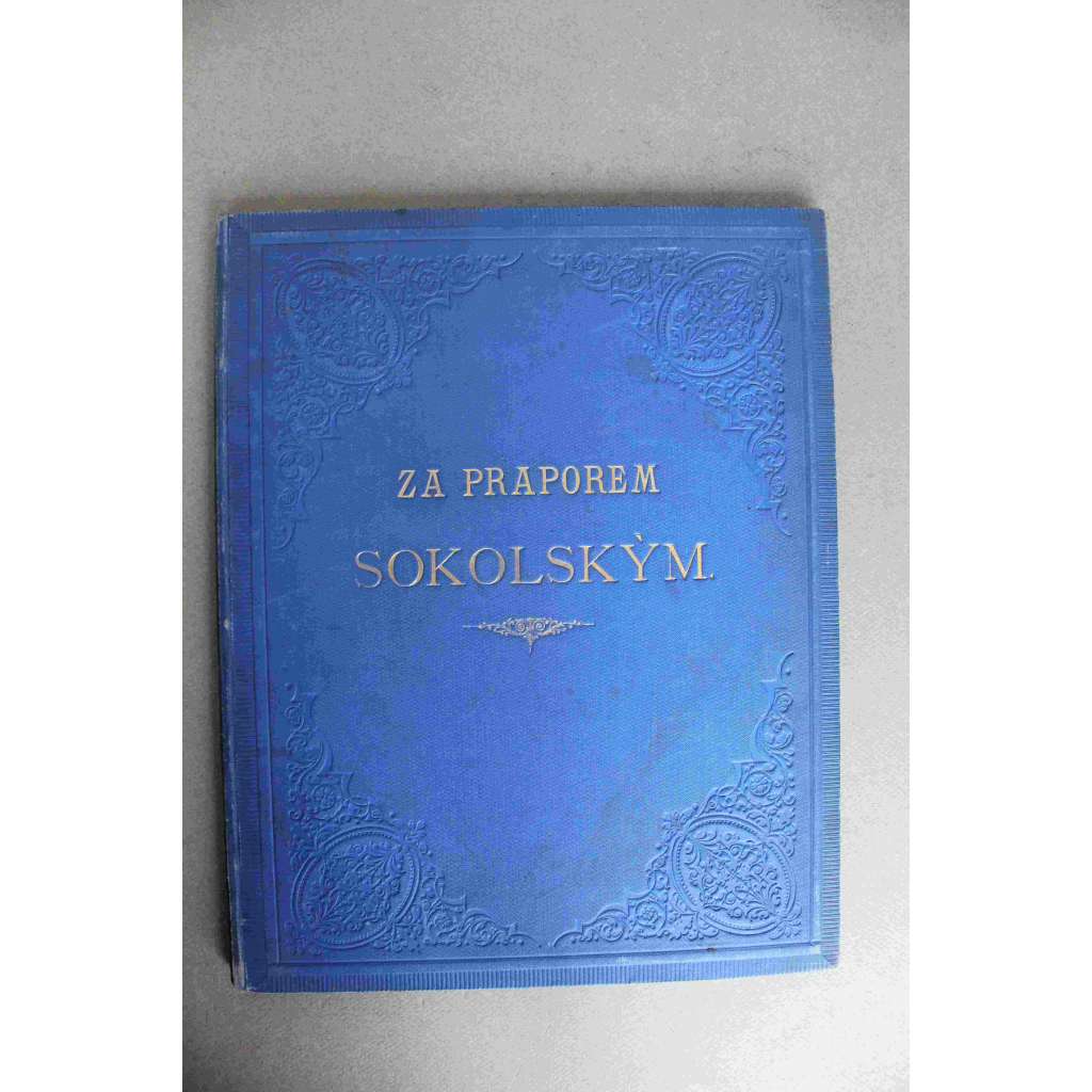 Za praporem sokolským. Posvěceno mužnému duchu Čechův (Česká obec sokolská, sokol, mj. Vzpomínka na Miroslava Tyrše, Večer na Šumavě, Jindřich Fügner, Tragika dějin slovanských; tlačená vazba)