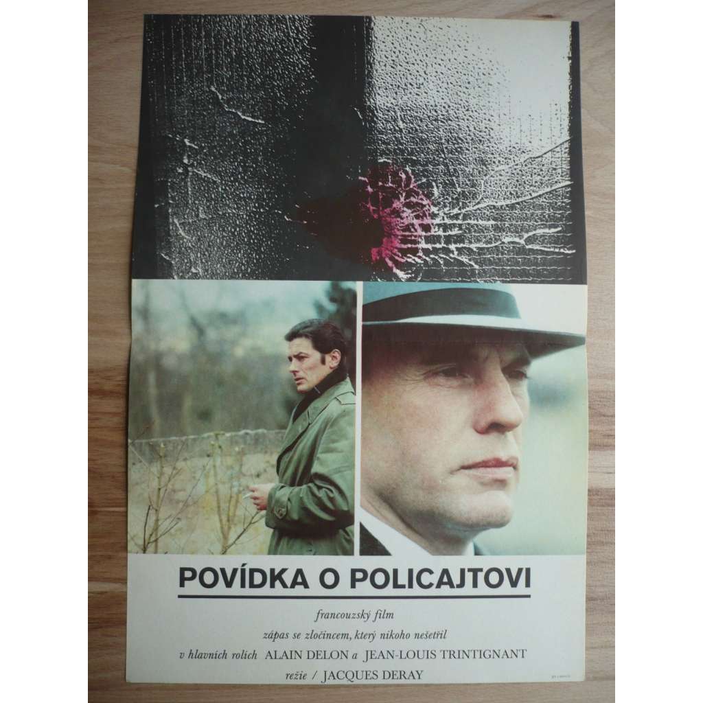 Povídka o policajtovi (filmový plakát, film Francie 1975, režie Jacques Deray, Hrají: Alain Delon, Jean-Louis Trintignant, Renato Salvatori)